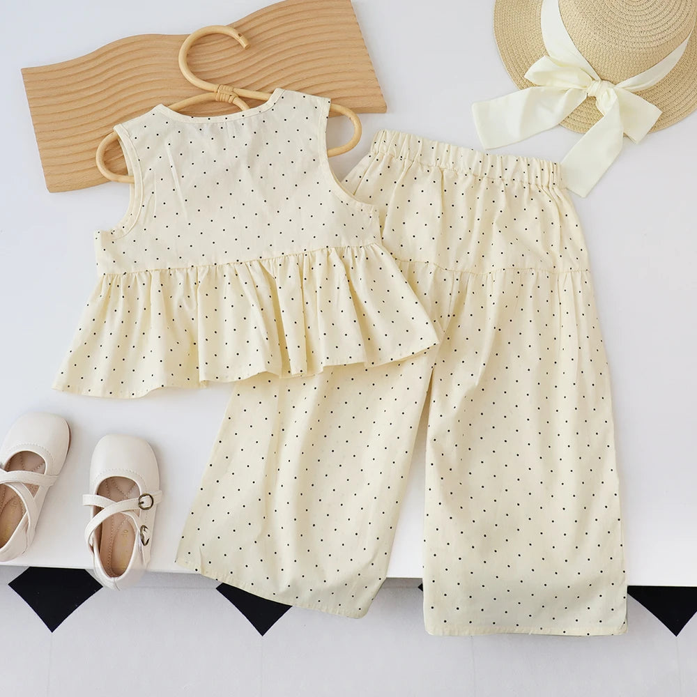 Bear Leader Baby-Mädchen-Freizeitkleidung, Rundhalsausschnitt, ärmelloses Polka-Dot-Oberteil + Hose mit weitem Bein, 2-teiliges Set mit Schleife und Knopf