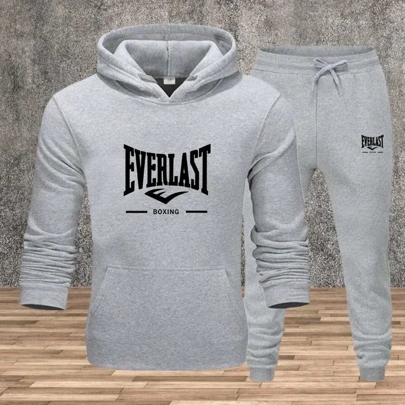 Ein neues modisches Fitness-Jogging-Freizeitset für Herren für Herbst und Winter, bestehend aus zweiteiligem Kapuzenpullover und Hose.
