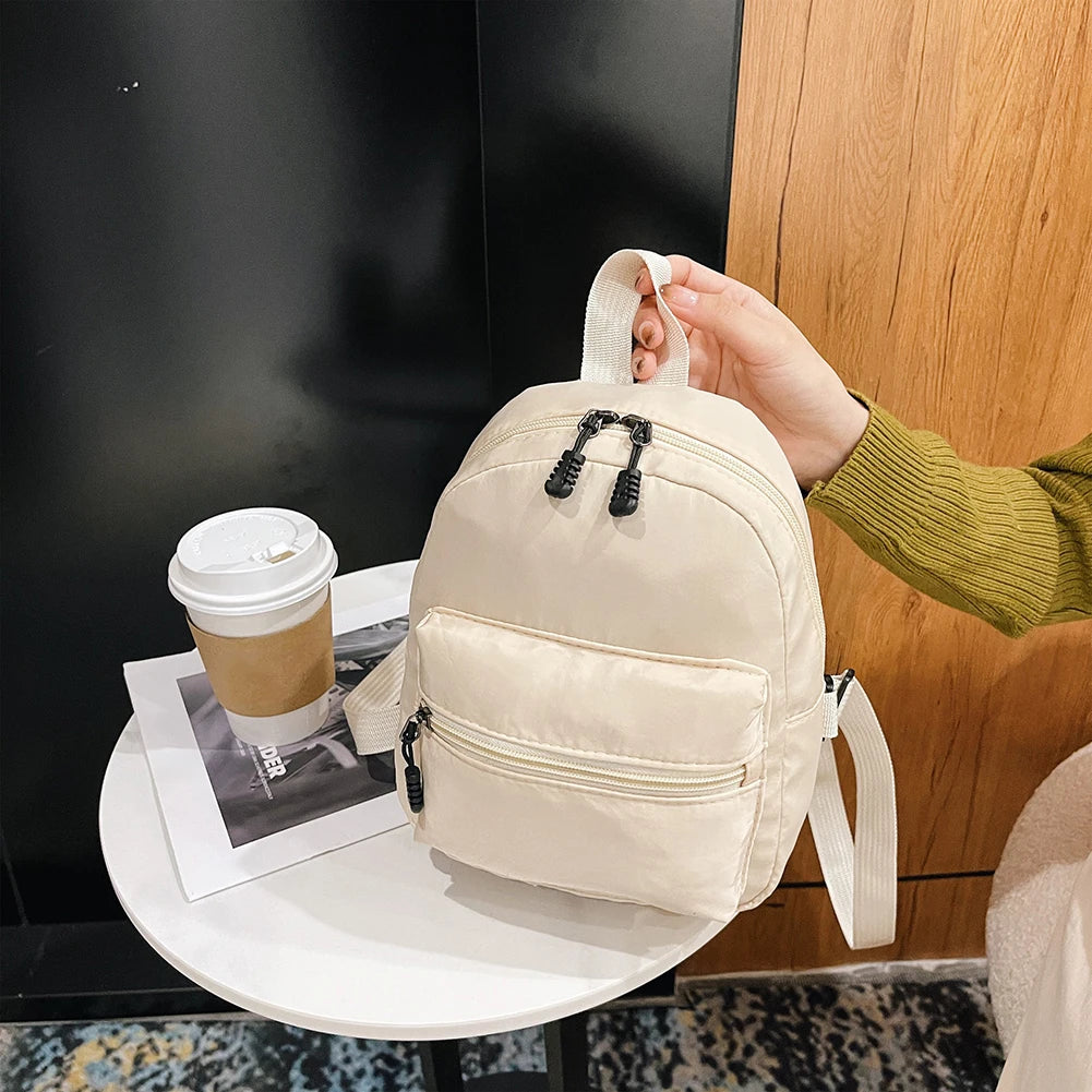 Mode einfarbig Rucksack Frauen Nylon Rucksack adrette Stil Mini Rucksäcke