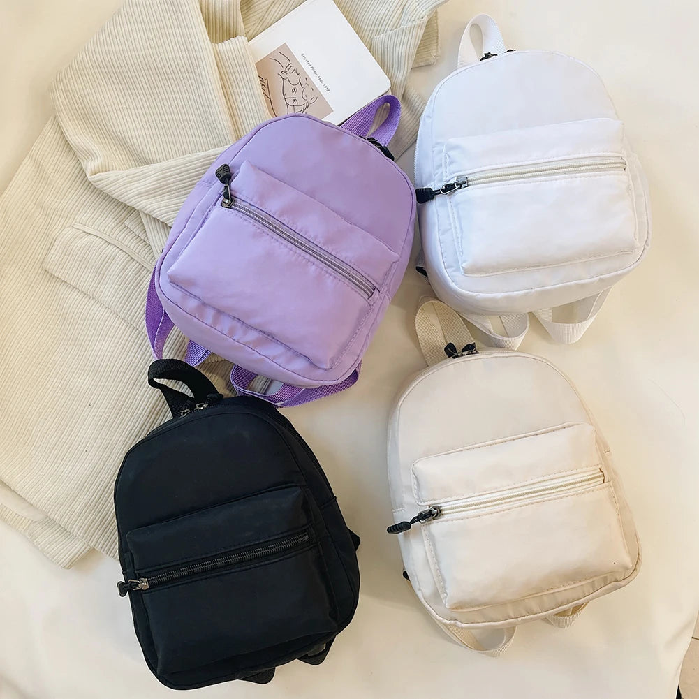 Mode einfarbig Rucksack Frauen Nylon Rucksack adrette Stil Mini Rucksäcke