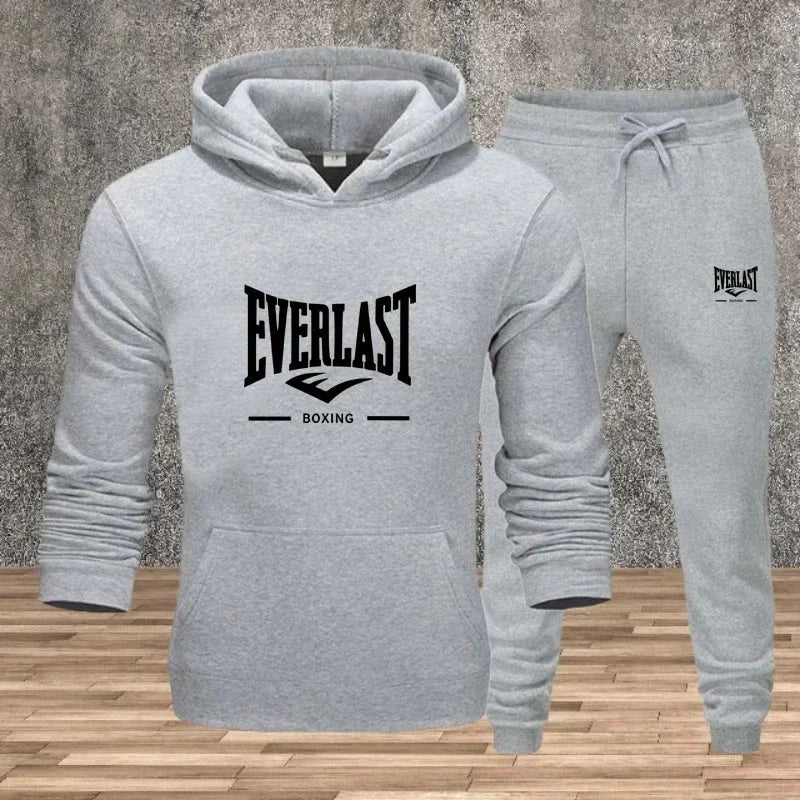 Ein neues modisches Fitness-Jogging-Freizeitset für Herren für Herbst und Winter, bestehend aus zweiteiligem Kapuzenpullover und Hose.