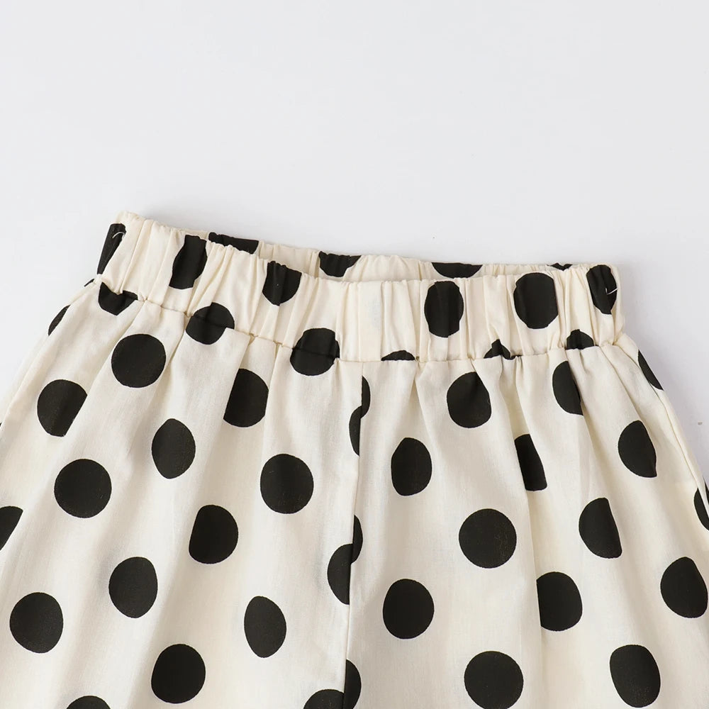 Bear Leader Baby-Mädchen-Freizeitkleidung, Rundhalsausschnitt, ärmelloses Polka-Dot-Oberteil + Hose mit weitem Bein, 2-teiliges Set mit Schleife und Knopf