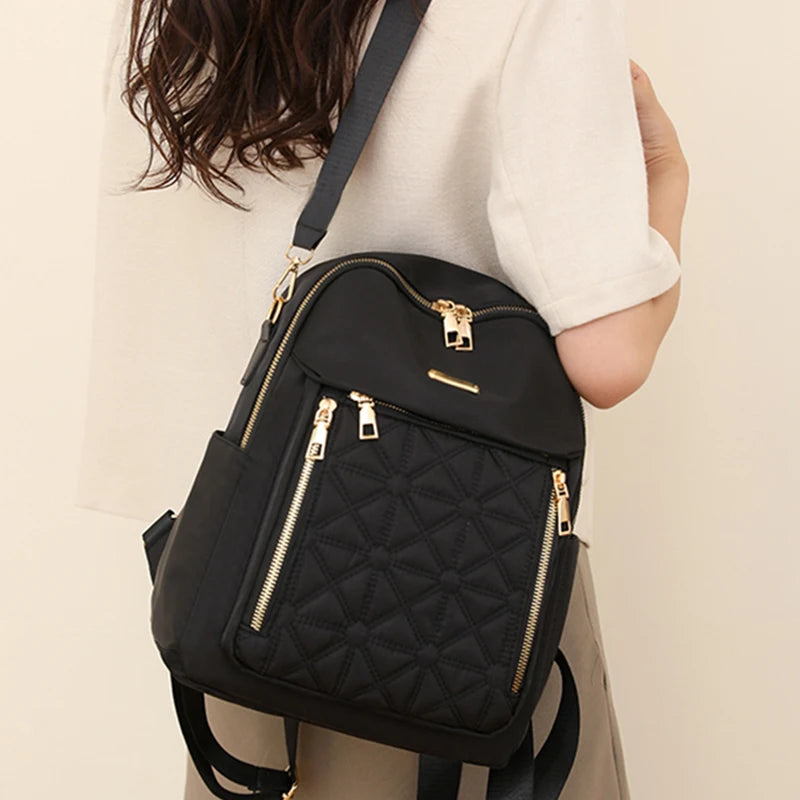 Eleganter Damenrucksack mit geprägtem Muster, gepolsterter Riemen, diebstahlsicherer Rucksack, geeignet für Schule und kurze Reisen