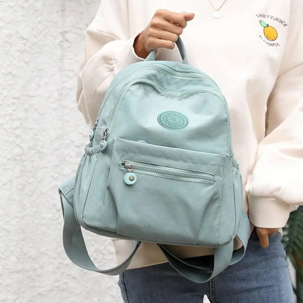Lässige Umhängetasche mit großer Kapazität Student wasserdichter leichter Mini-Rucksack verschleiß feste kleine Rucksack reise
