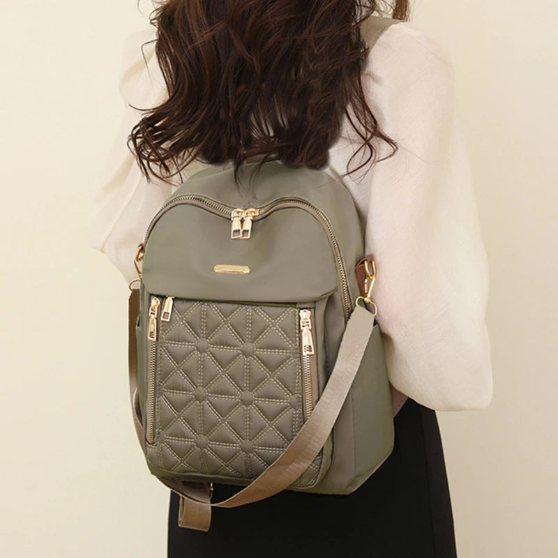 Eleganter Damenrucksack mit geprägtem Muster, gepolsterter Riemen, diebstahlsicherer Rucksack, geeignet für Schule und kurze Reisen