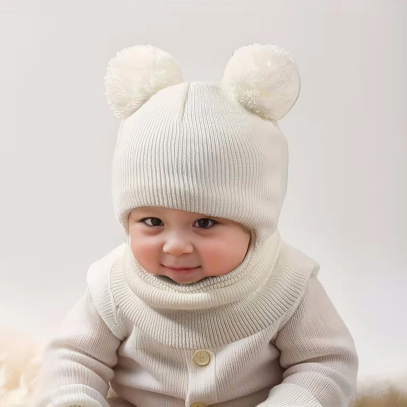 Einteilige Wintermütze für Kinder mit Kapuze, ausgestattet mit Ohr- und Nackenschutzgeräten, für Wärme. Doppelkugel-Strickmütze