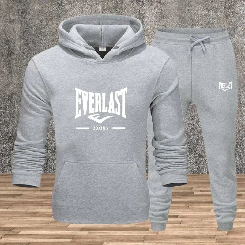 Ein neues modisches Fitness-Jogging-Freizeitset für Herren für Herbst und Winter, bestehend aus zweiteiligem Kapuzenpullover und Hose.