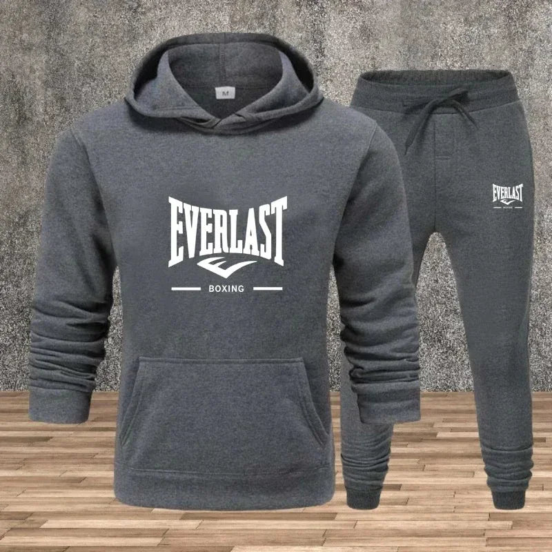 Ein neues modisches Fitness-Jogging-Freizeitset für Herren für Herbst und Winter, bestehend aus zweiteiligem Kapuzenpullover und Hose.