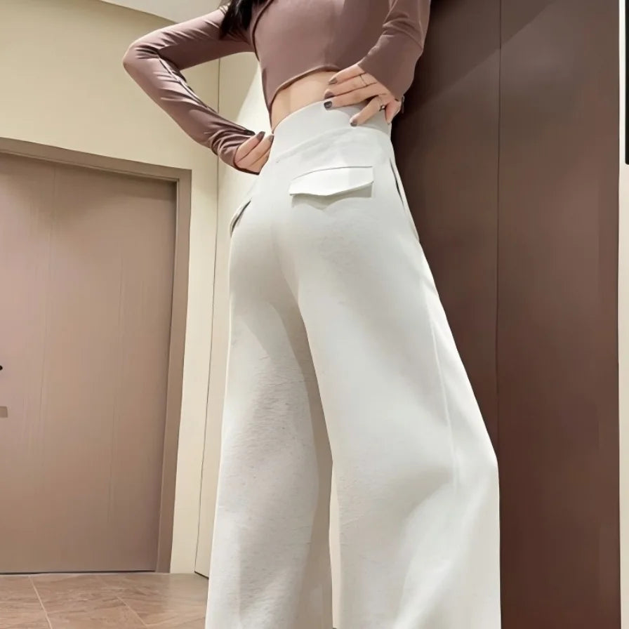 Graue Sporthose für Damen mit hoher Taille und lockerem, schlankem, geradem Bein und weitem Bein. Amerikanische Jogginghose.